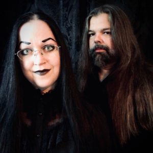 Two gothic people together singers of the band